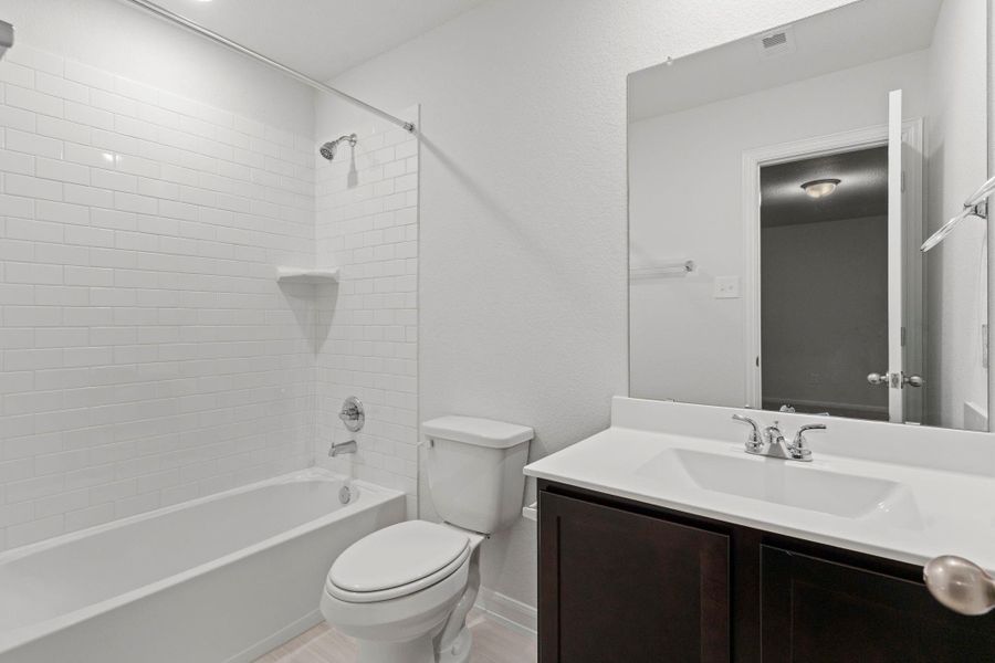 The private guest bathroom is wonderful for guest or that teenage in your family that needs their own private bathroom!  Wonderful open floor plan!