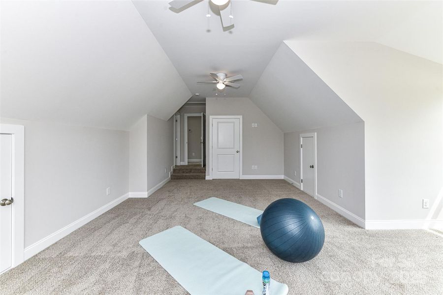 Large Bonus Room with attic storage & dual ceiling fans! Large Bonus Room with attic storage & dual ceiling fans!