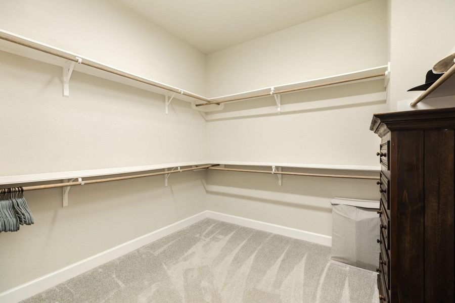 This over-sized dream closet offers amazing storage! Unlike wire closet systems, these sturdy upper and lower wooden hanging racks will safely handle the weight of your clothing.