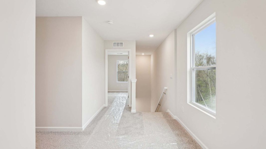 Spacious, unfurnished interior of a new home in The Pines at Blake Farm, Wilmington (Image 13). Spacious, unfurnished interior of a new home in The Pines at Blake Farm, Wilmington (Image 13).