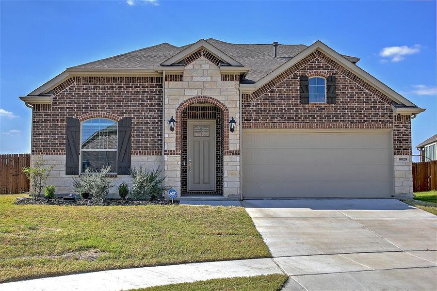 Front exterior of a new home in Preserve at Honey Creek: Brookstone Collection, McKinney, TX, highlighting curb appeal (Image 1).