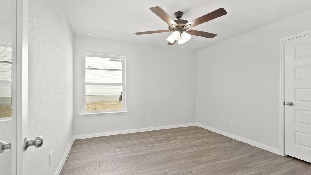 Spacious, unfurnished interior of a new home in Hunters Ranch, San Antonio (Image 18).