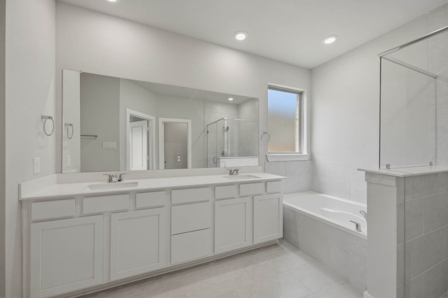 Furnished interior view inside a new home in Sunterra 40, Katy (Image 11).