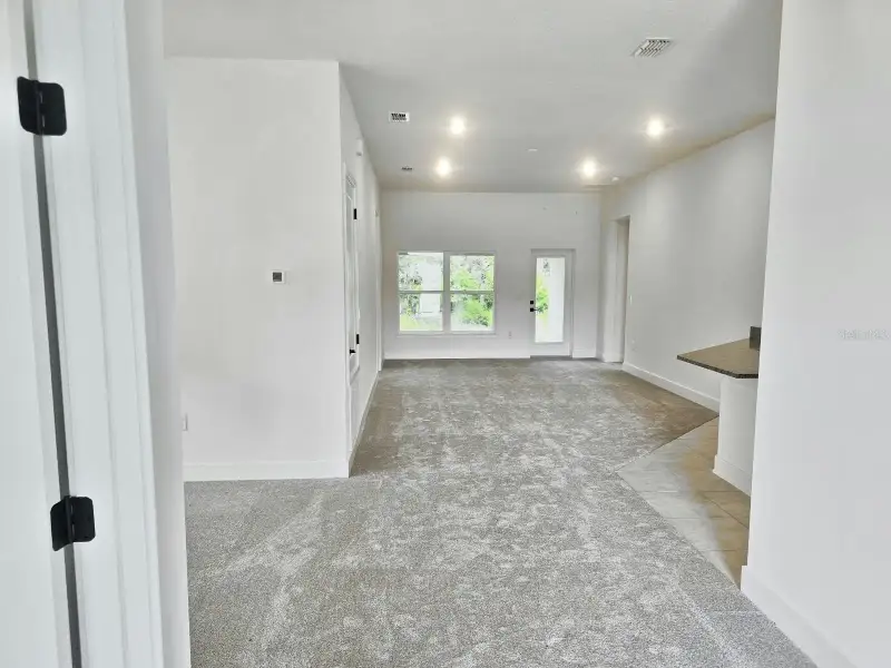 Spacious, unfurnished interior of a new home in Harmony Central, St. Cloud (Image 12).