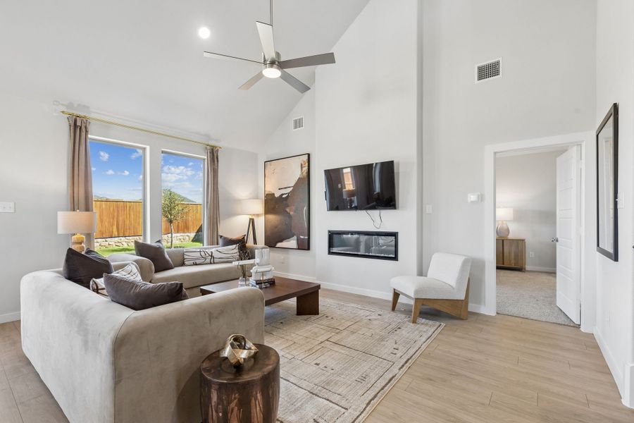 Living Room in a Sunset Ranch Winters Model Home in Gunter TX by Trophy Signature Homes