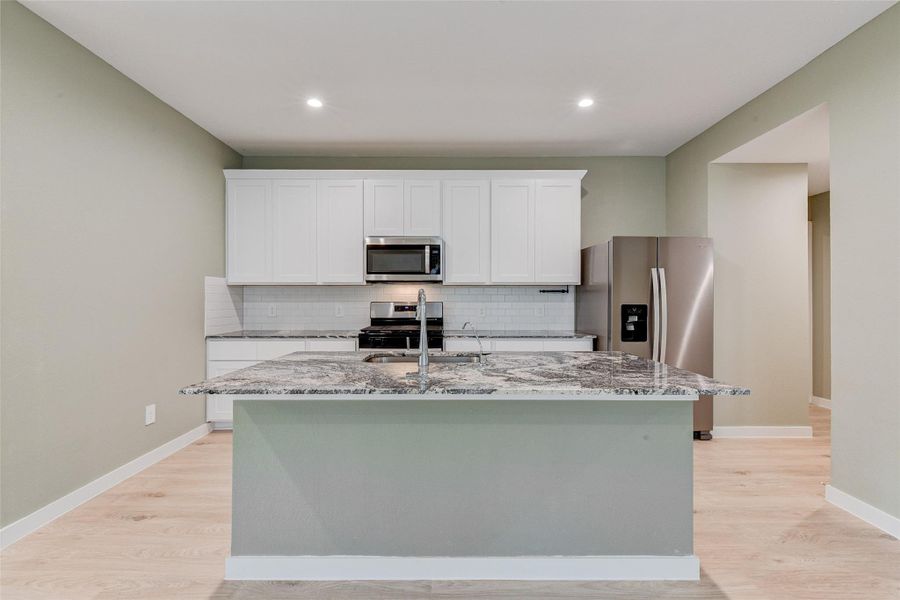 Furnished interior view inside a new home in Post Oak Pointe, Fresno (Image 7).