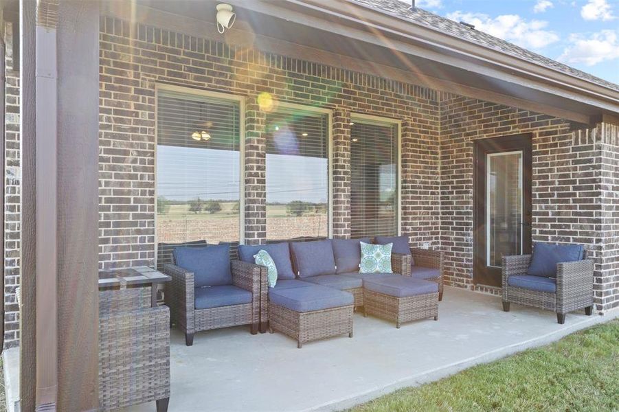 View of patio with outdoor lounge area