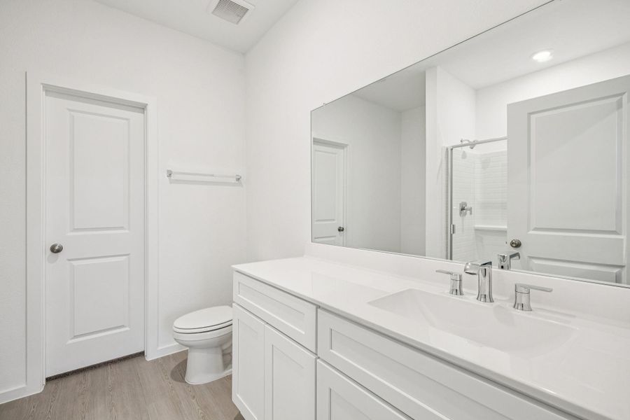 Furnished interior view inside a new home in Decker Farms, Magnolia (Image 7).