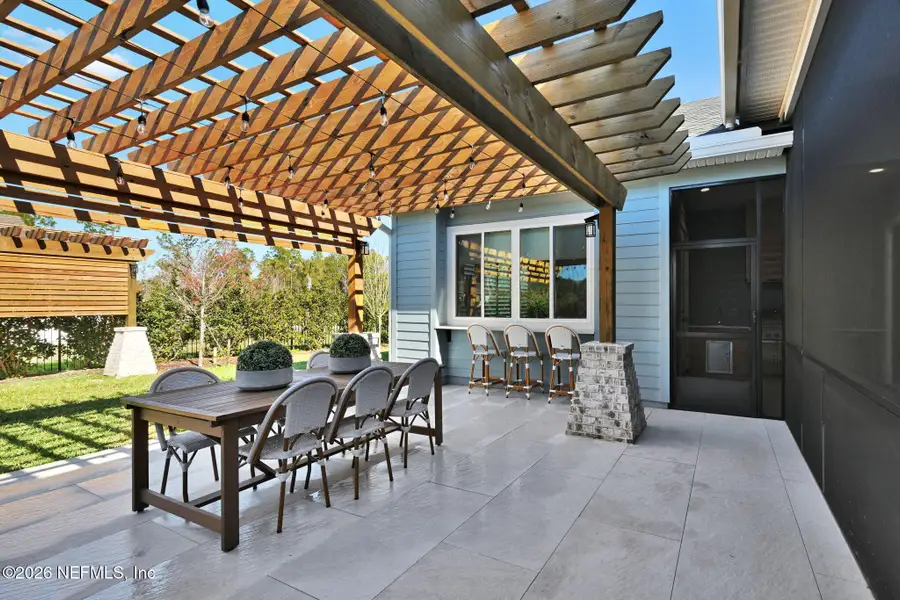 Exterior details and patio area of a home in Palmetto Cove, Ponte Vedra (Image 3).