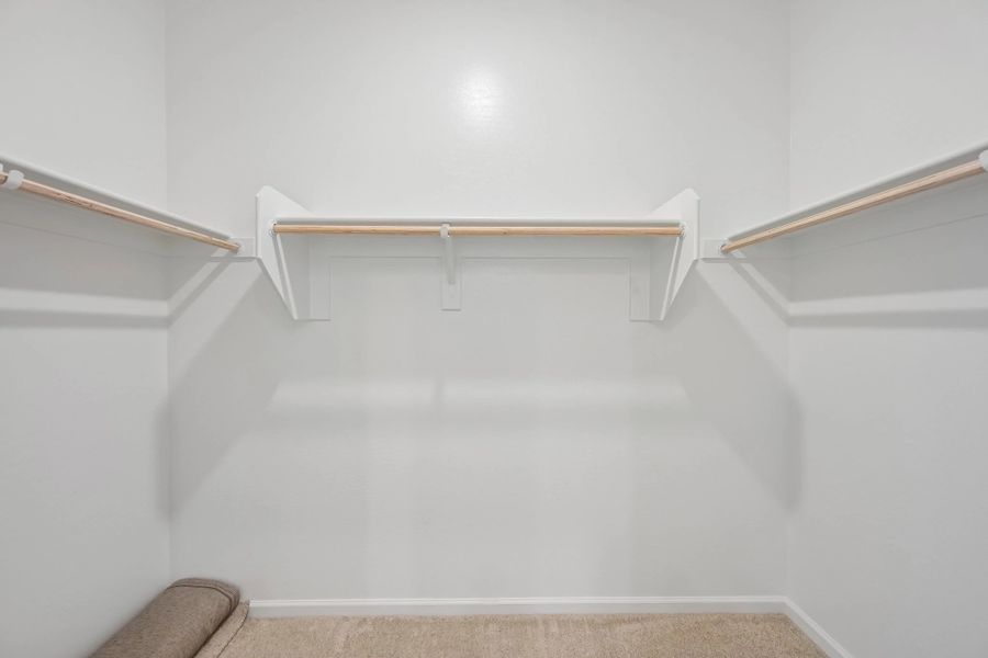 Primary walk in closet Primary walk in closet
