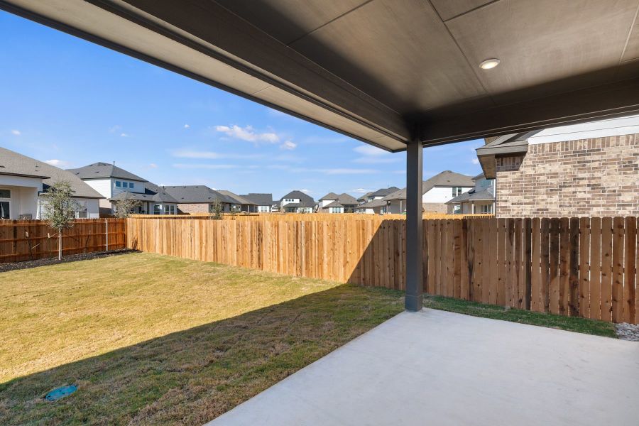 Exterior details and patio area of a home in Heritage, Dripping Springs (Image 4).