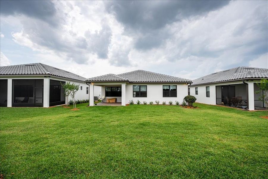 Front exterior of a new home in , Port St. Lucie, FL, highlighting curb appeal (Image 17). Front exterior of a new home in , Port St. Lucie, FL, highlighting curb appeal (Image 17).