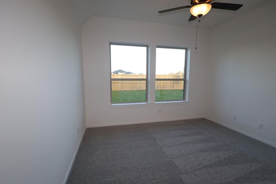 Spacious, unfurnished interior of a new home in Meridiana - Terrace Collection, Manvel (Image 13).