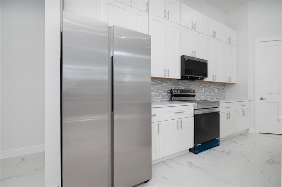 Furnished interior view inside a new home in , Palm Coast (Image 7).
