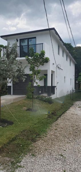 Front exterior of a new home in , Fort Lauderdale, FL, highlighting curb appeal (Image 2). Front exterior of a new home in , Fort Lauderdale, FL, highlighting curb appeal (Image 2).