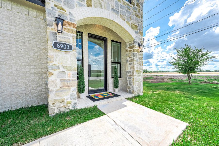 Exterior details and patio area of a home in , Needville (Image 27).