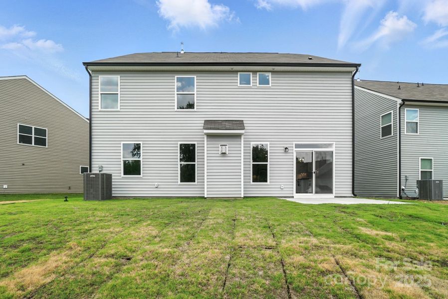 Front exterior of a new home in Hampton Woods, Charlotte, NC, highlighting curb appeal (Image 26).