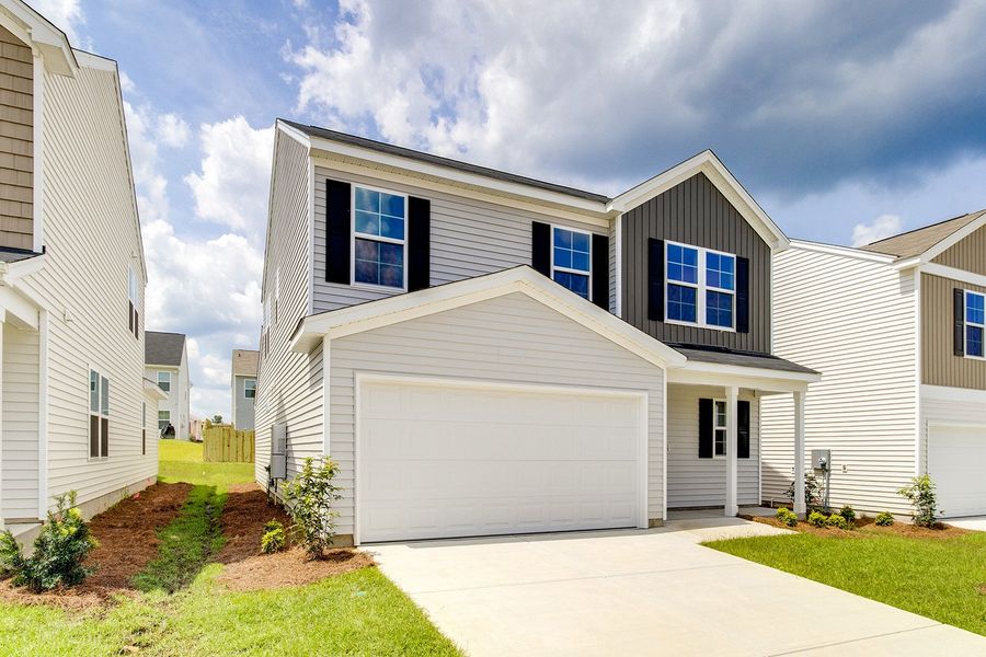 Front exterior of a new home in Winston Point, Gilbert, SC, highlighting curb appeal (Image 2). Front exterior of a new home in Winston Point, Gilbert, SC, highlighting curb appeal (Image 2).