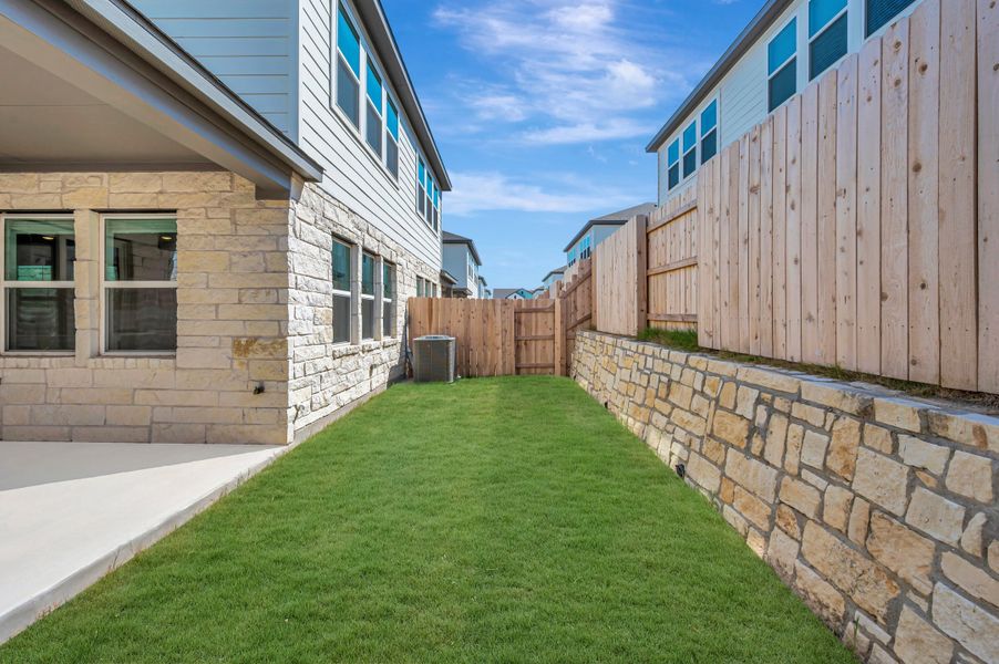 Exterior details and patio area of a home in Park Central, Georgetown (Image 25).