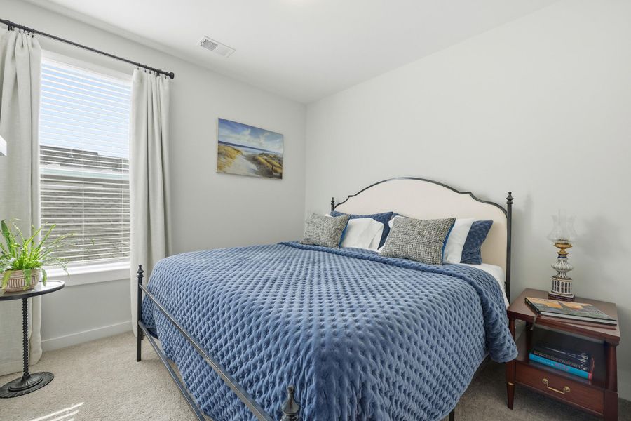 Furnished interior view inside a new home in Homecoming, Ravenel (Image 32). Furnished interior view inside a new home in Homecoming, Ravenel (Image 32).