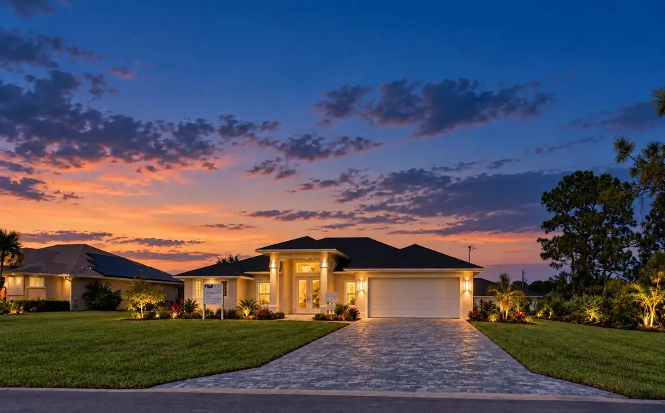Warmly lit home at blue hour Warmly lit home at blue hour