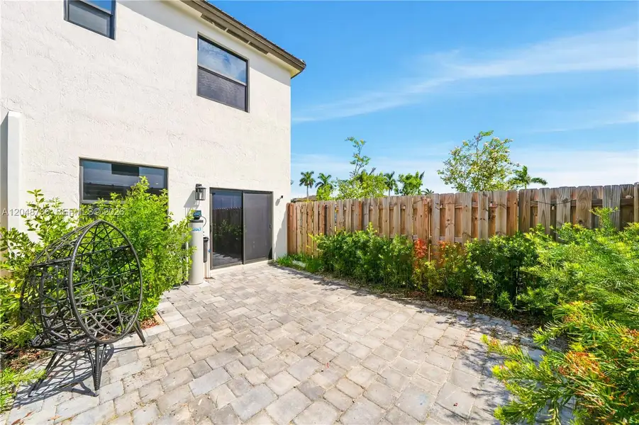 Exterior details and patio area of a home in , Miami (Image 3). Exterior details and patio area of a home in , Miami (Image 3).
