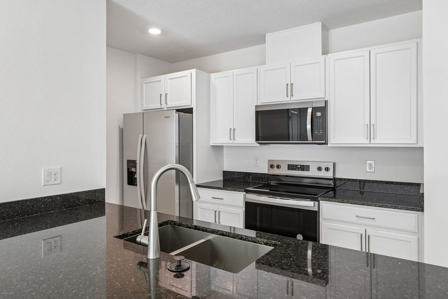 Furnished interior view inside a new home in Reserve at Forest Lake Townhomes, Lake Wales (Image 7).