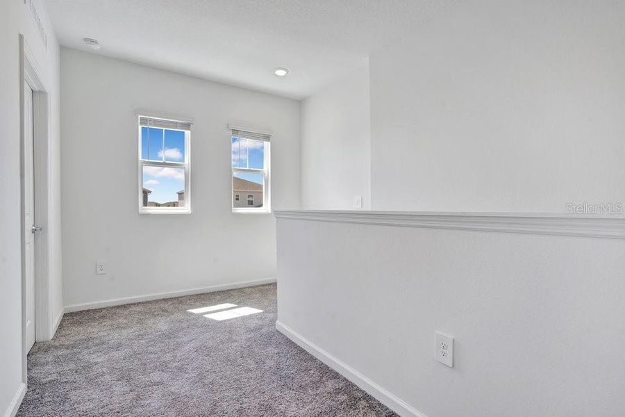 Spacious, unfurnished interior of a new home in Wellness Ridge, Clermont (Image 36).
