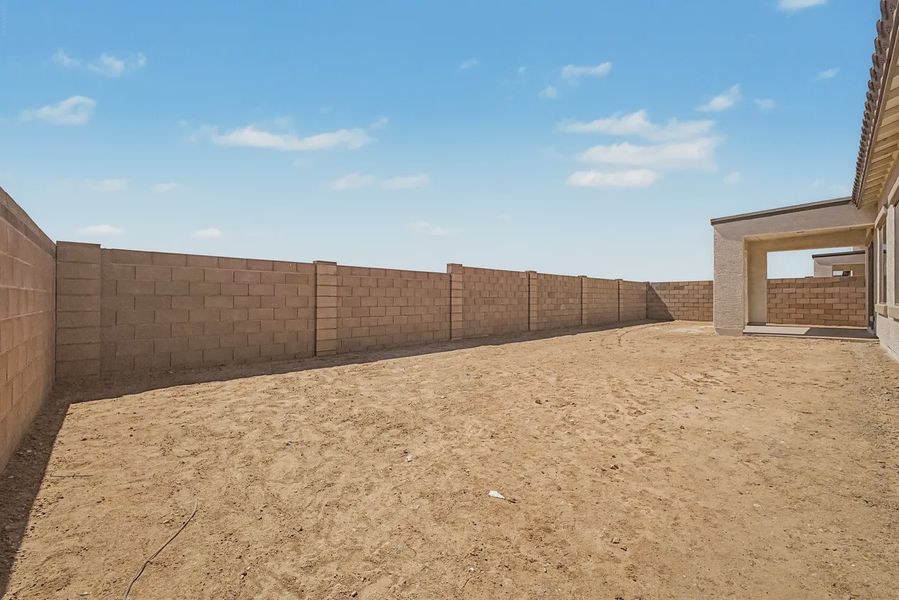Exterior details and patio area of a home in Valencia at Granite Vista, Waddell (Image 25).