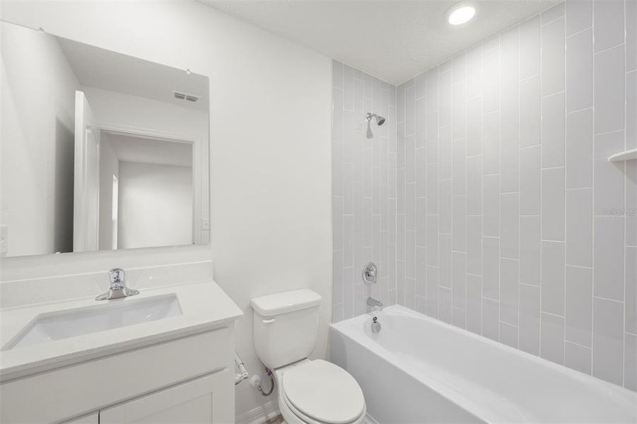 Furnished interior view inside a new home in Tula Parc, Astatula (Image 10).