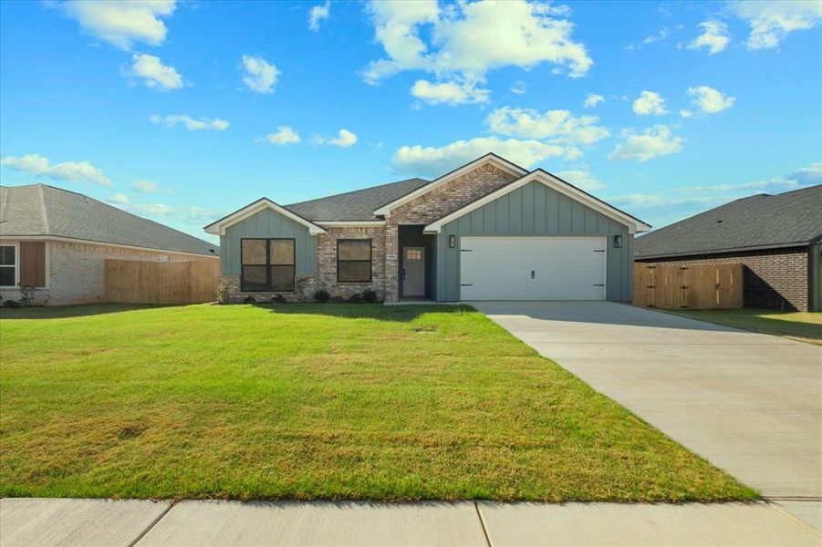 Front exterior of a new home in , Lindale, TX, highlighting curb appeal (Image 23).