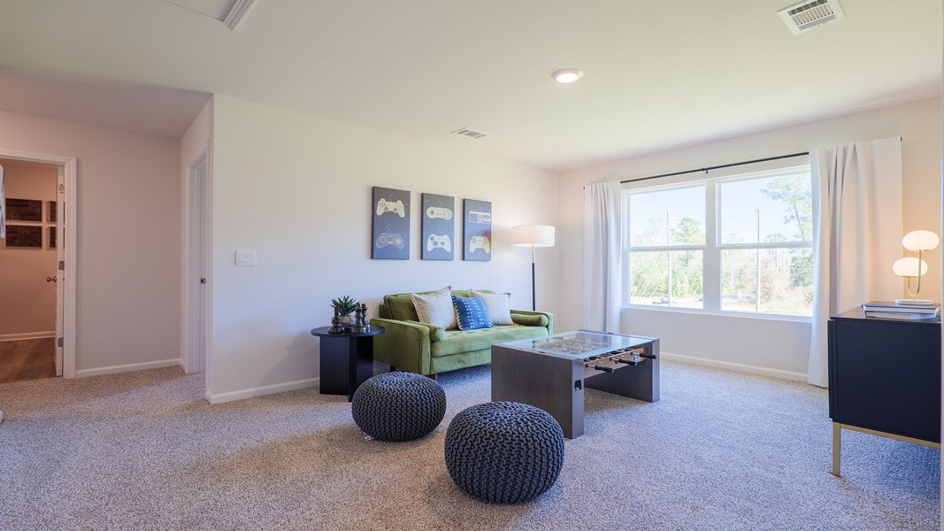 Representative furnished interior of a home built from the The Carol by D.R. Horton in Olson Ridge, Tallahassee (Image 13).