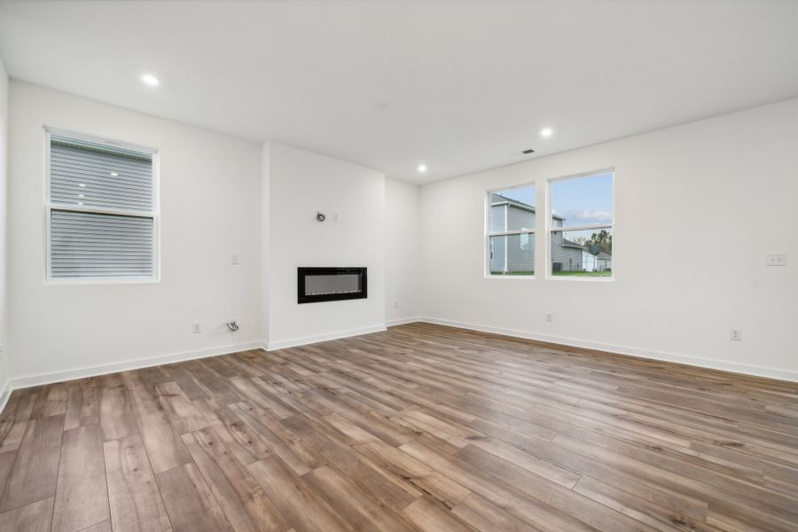 A room with a wood floor and a wood floor. A room with a wood floor and a wood floor.