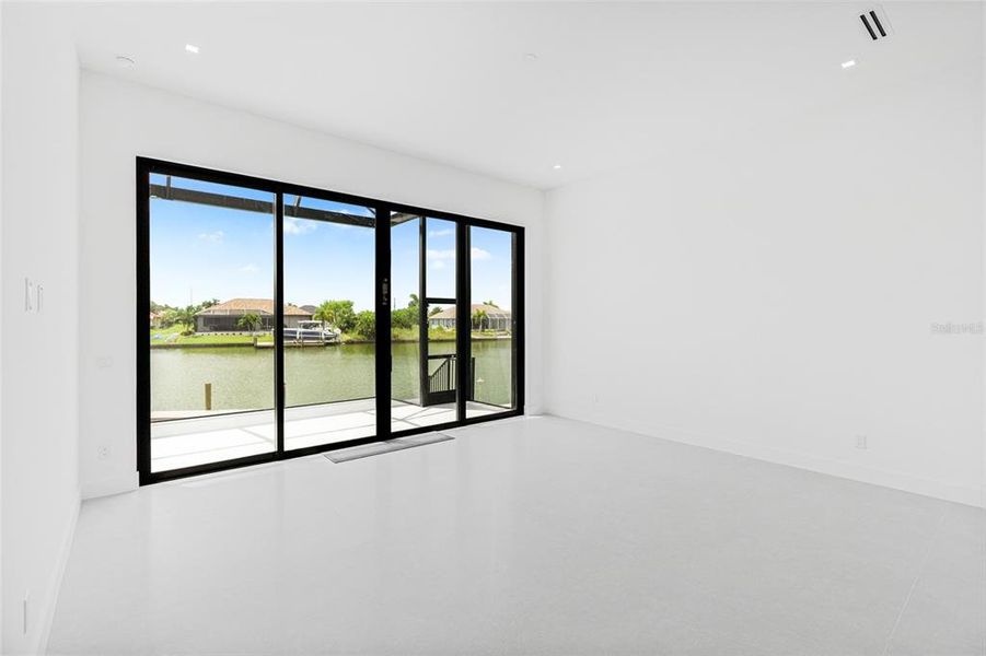 Spacious, unfurnished interior of a new home in , Port Charlotte (Image 25).