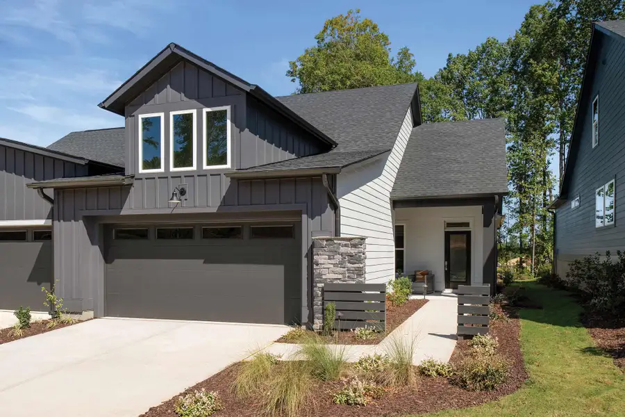 Front exterior of a new home in Encore at Chatham Park – Villa Series, Pittsboro, NC, highlighting curb appeal (Image 2). Front exterior of a new home in Encore at Chatham Park – Villa Series, Pittsboro, NC, highlighting curb appeal (Image 2).