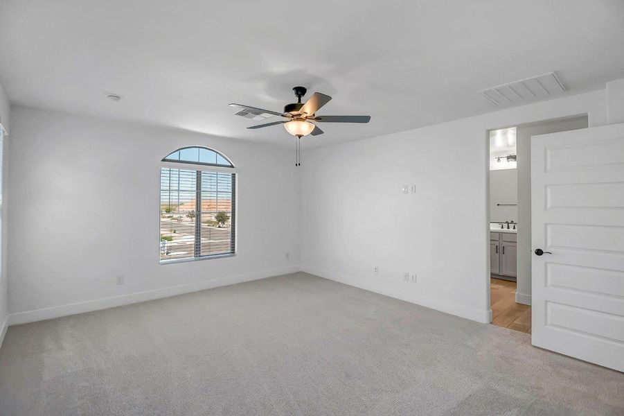 Spacious, unfurnished interior of a new home in Ironwood Villages at North Creek, Queen Creek (Image 22).