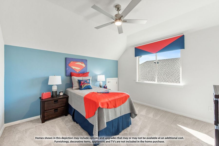 Children's bedroom with vaulted ceiling, ceiling fan, blue accent wall, and carpet flooring Children's bedroom with vaulted ceiling, ceiling fan, blue accent wall, and carpet flooring