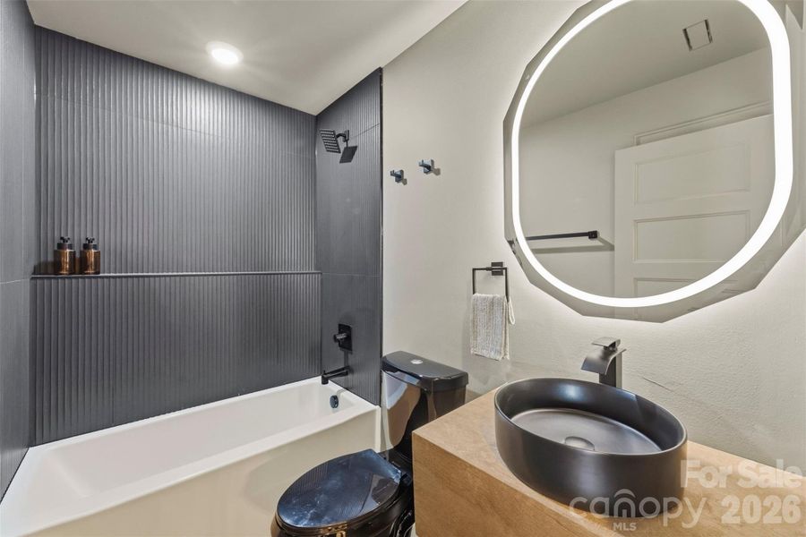 Spa-inspired bath with modern fixtures and elegant finishes designed for relaxation and luxury