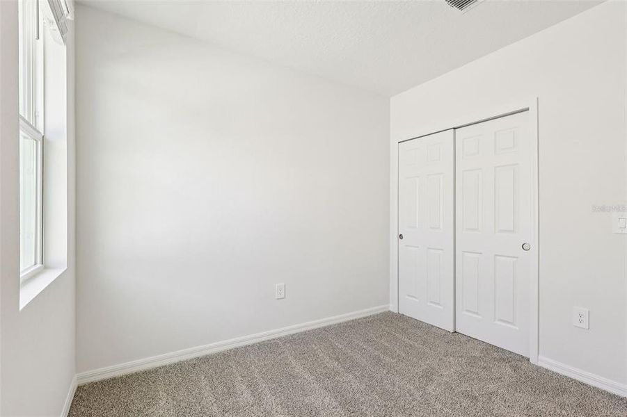 Spacious, unfurnished interior of a new home in Springs at Lake Alfred - Classic Series, Lake Alfred (Image 26).