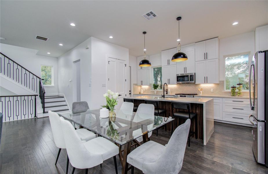 Kitchen opens up to the dining room