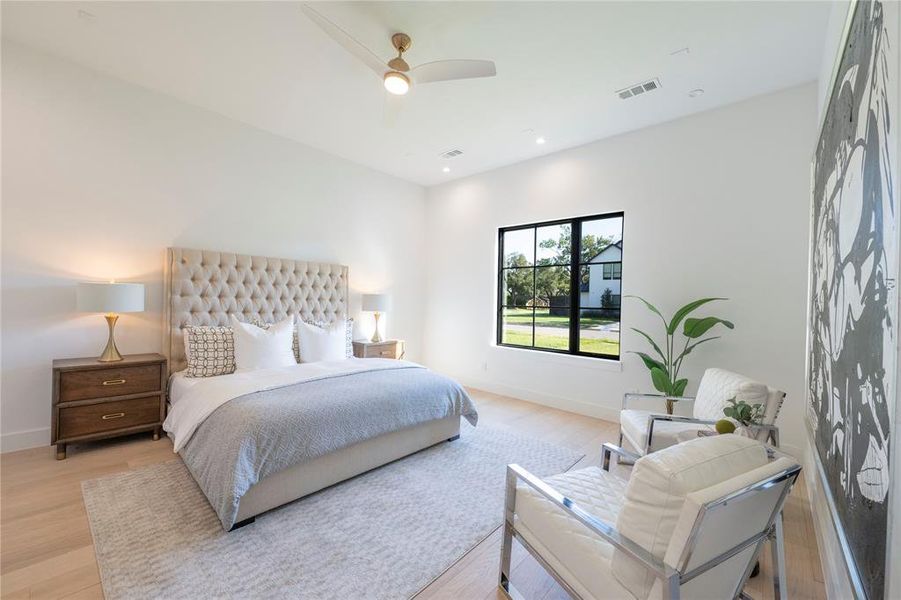 Bedroom with light wood-type flooring and ceiling fan