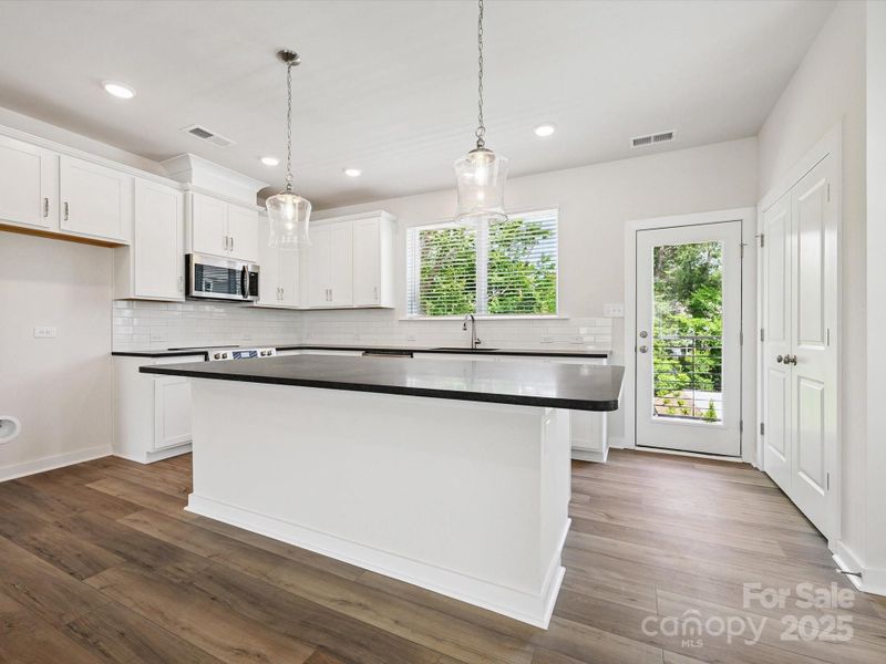 Furnished interior view inside a new home in Central Living at Craig, Charlotte (Image 10).