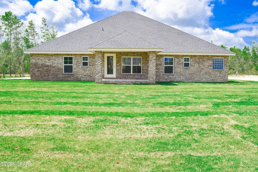 Exterior details and patio area of a home in Cedar Creek at Deerpoint Lake, Panama City (Image 4).
