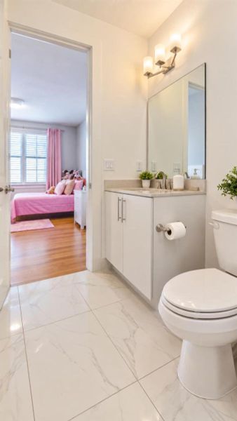 Modern Bathroom with Pink Bedroom View Modern Bathroom with Pink Bedroom View