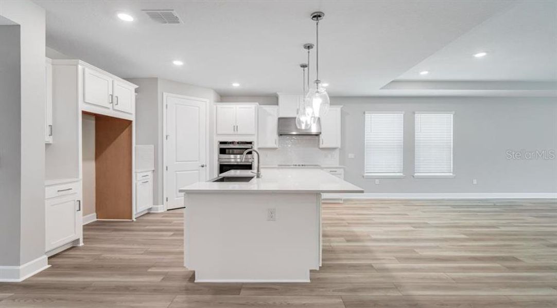 Furnished interior view inside a new home in The Cove at West Port, Port Charlotte (Image 9).
