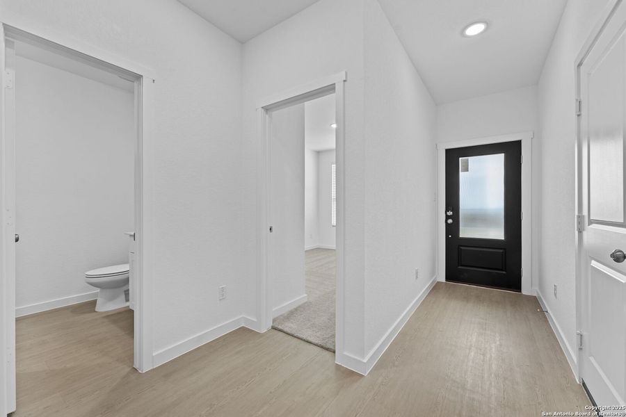 Spacious, unfurnished interior of a new home in Waterwheel: Coastline Collection, San Antonio (Image 22).