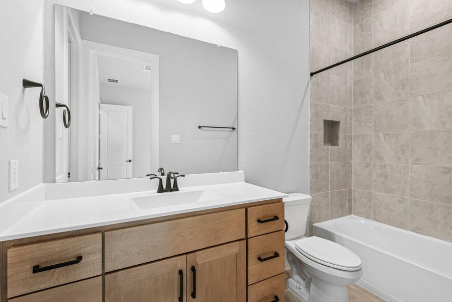 Furnished interior view inside a new home in Sienna 65' Homesites, Missouri City (Image 16).