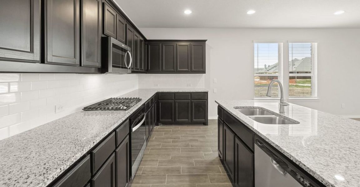 Representative exterior photo of a completed home built from the Brewer by Impression Homes in Redden Farms, Midlothian, TX (Image 10). Representative exterior photo of a completed home built from the Brewer by Impression Homes in Redden Farms, Midlothian, TX (Image 10).