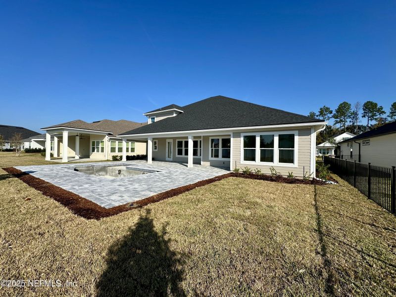 Exterior details and patio area of a home in SilverLeaf, St. Augustine (Image 2).