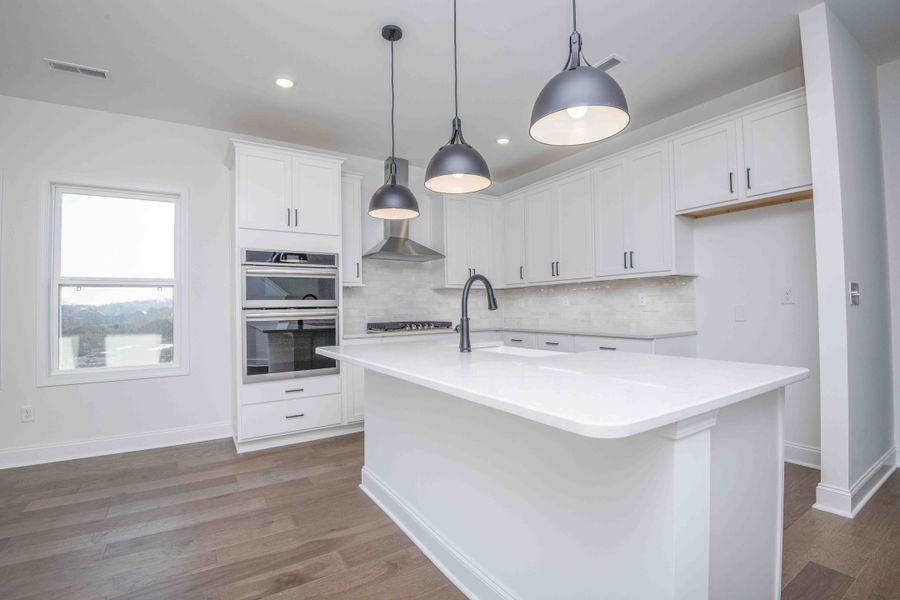 *Photo of example home. Selections and Finishes May Vary.*